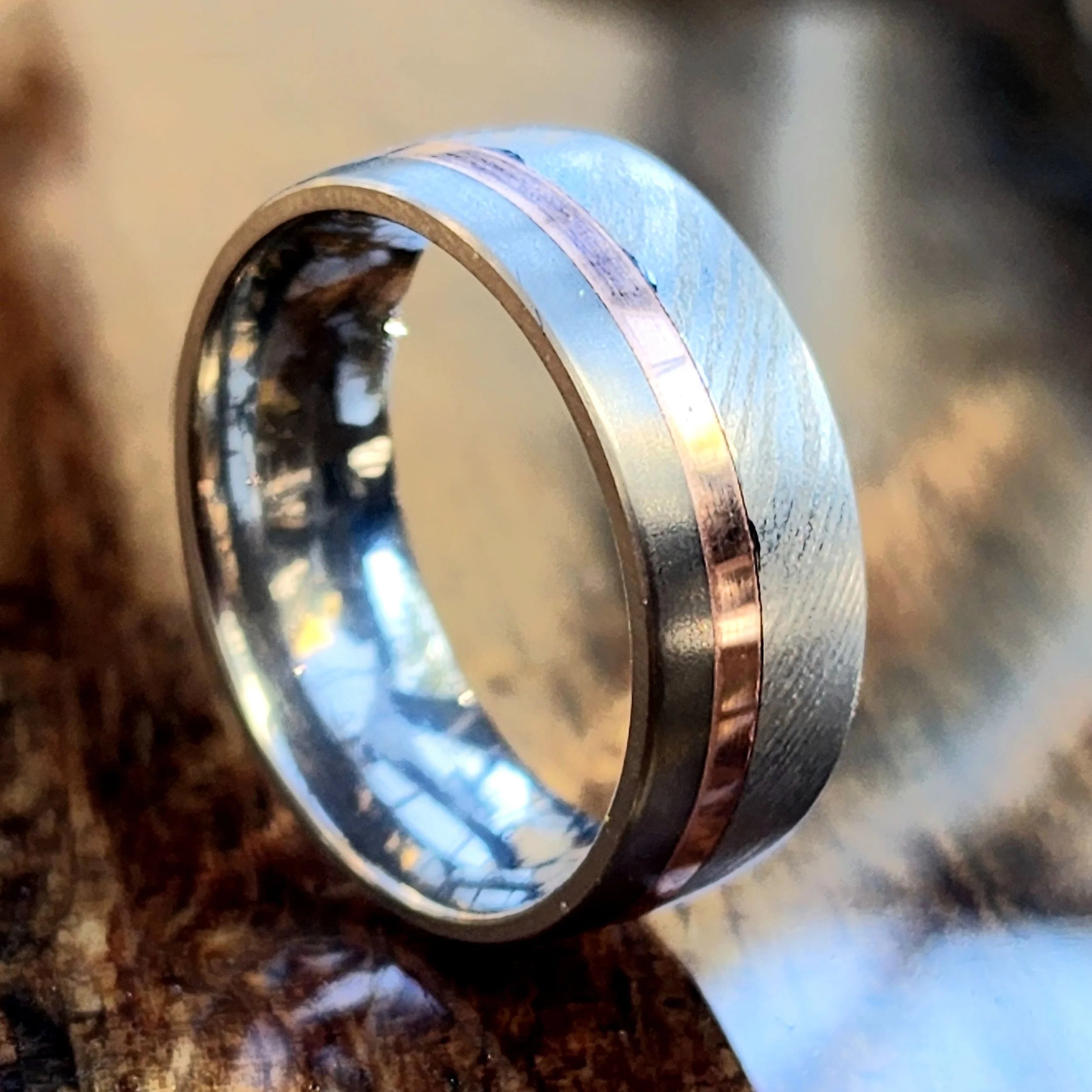 Titanium with Stainless Steel Damascus and copper accent