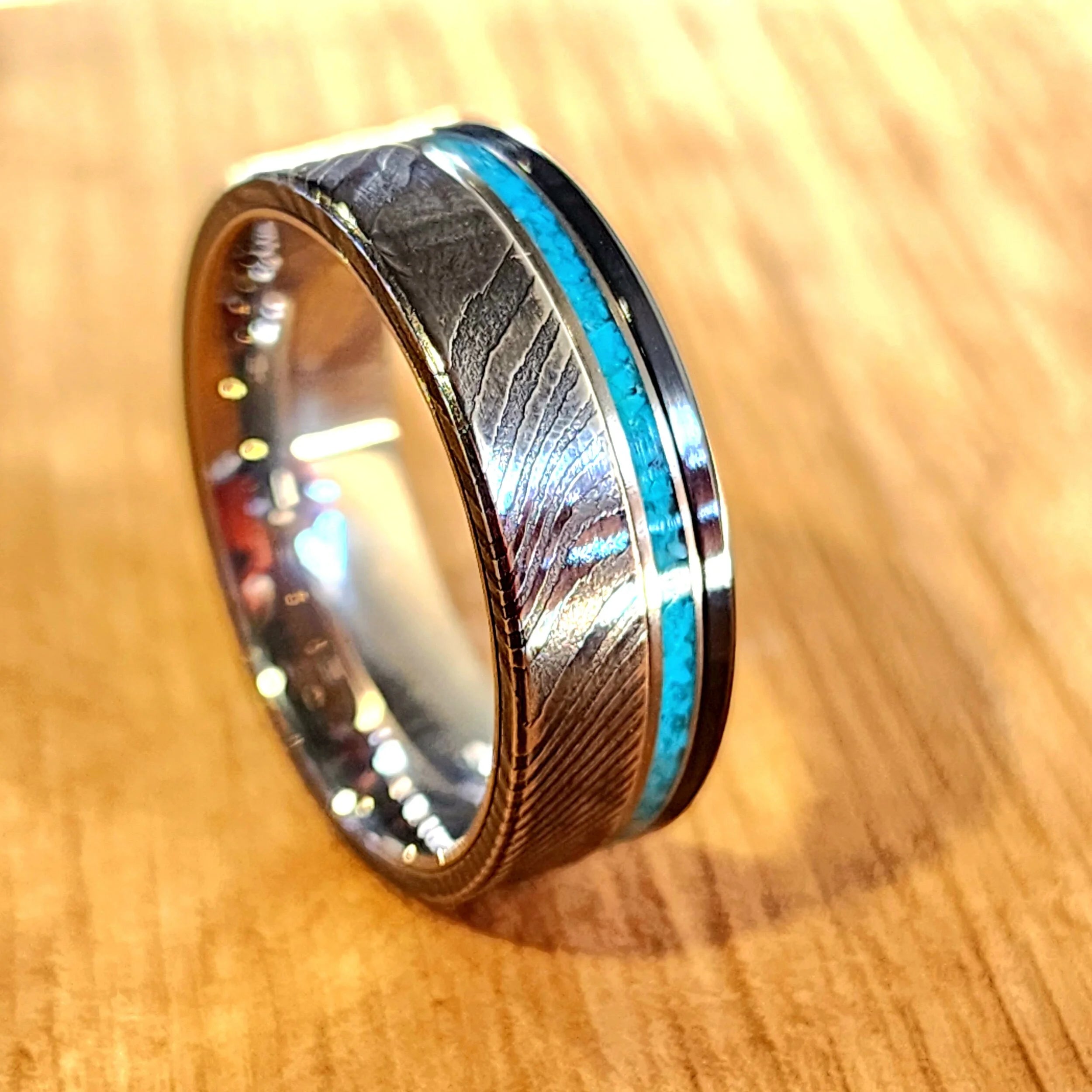 Stainless Steel Damascus and black titanium with turquoise accent