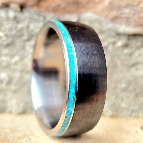 Black titanium and titanium with thin turquoise accent