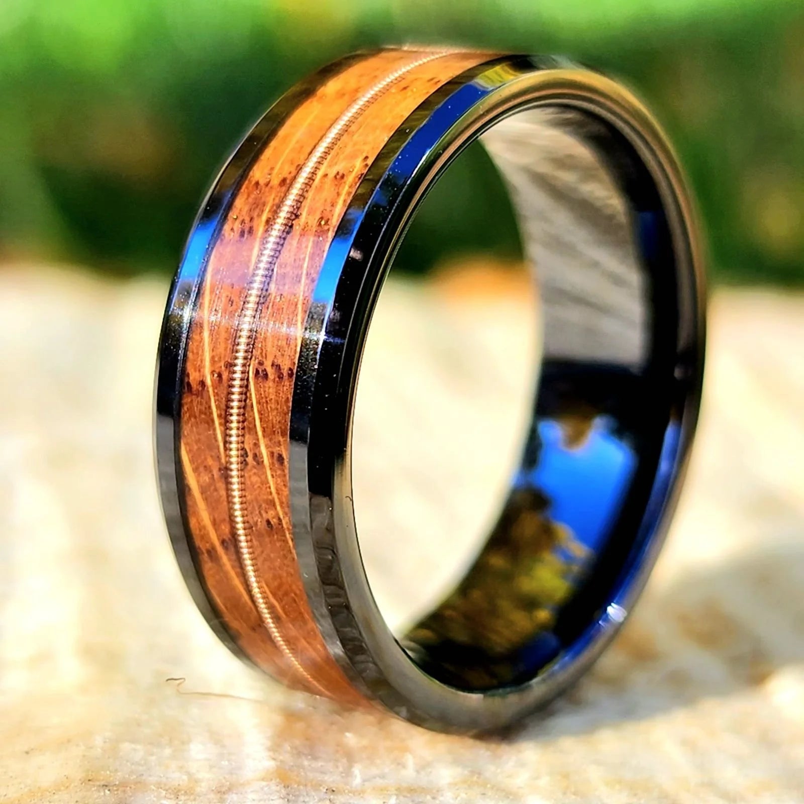 Black ceramic core with bourbon barrel and guitar string